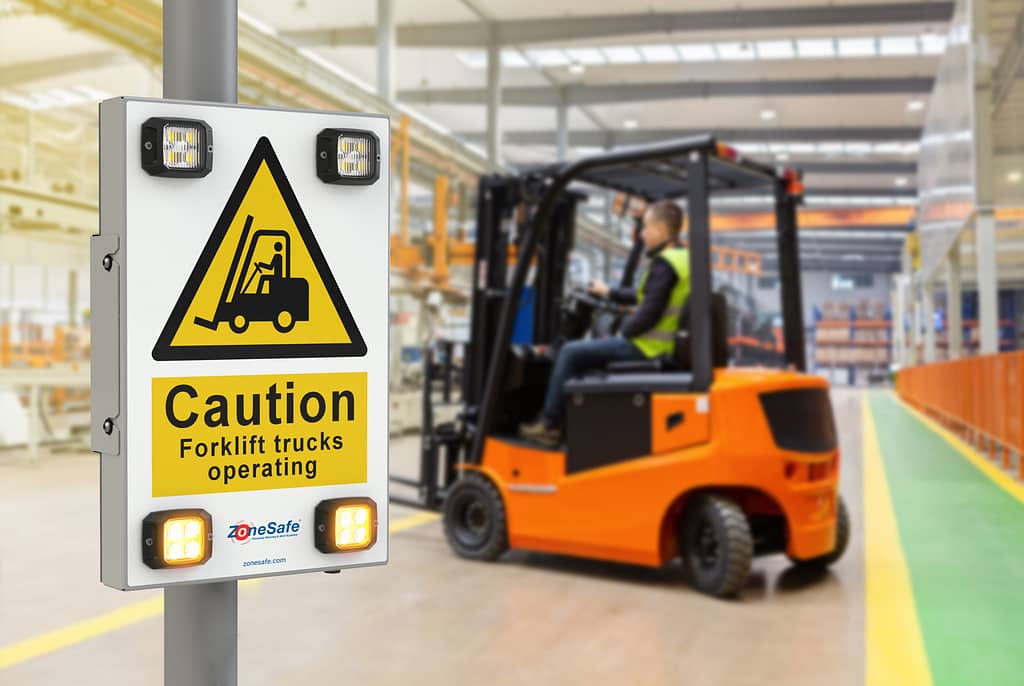 vehicle-activated-signage-in-warehouse-next-to-forklift